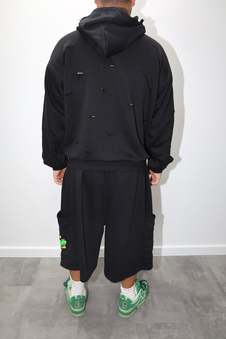 PANTALONE CON TASCONE LATERALE