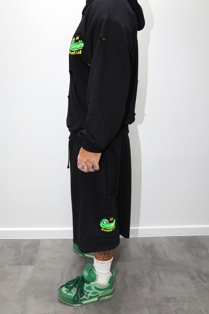 PANTALONE CON TASCONE LATERALE